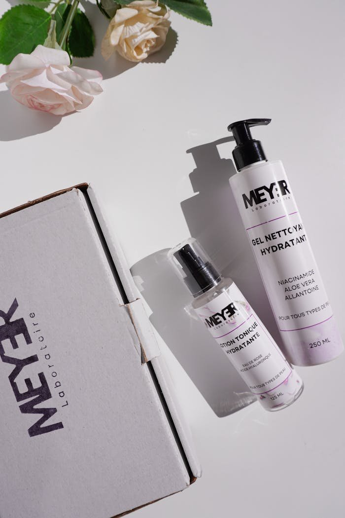 Hydrating skincare products with elegant floral decor for a fresh look.